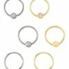 Best Sale ⭐ Multi-Pack Titanium Silvertone and Goldtone Seamless Hoop Nose Rings 6 Pack - 20 Gauge 🌟 -Playboy Shop 03883121 a