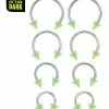 Buy 👍 Multi-Pack Glow in the Dark Green Horseshoe Rings 4 Pair - 16 Gauge 😀 -Playboy Shop 04100418 a